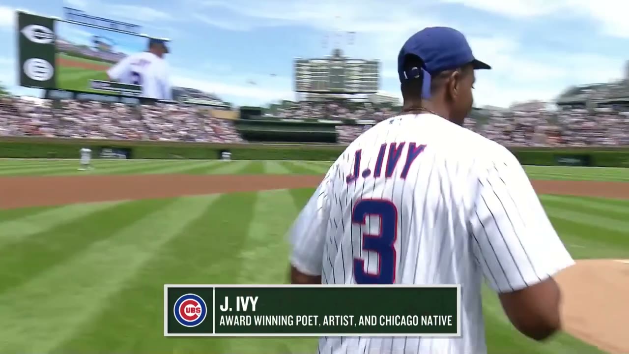 J. Ivy throws the ceremonial first pitch at Wrigley Field for the Chicago Cubs